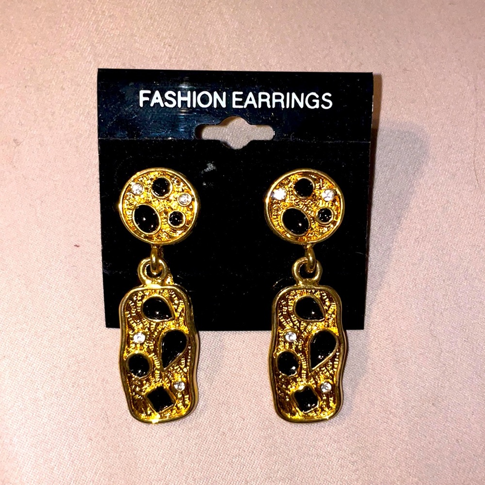 Gold earrings with black accents